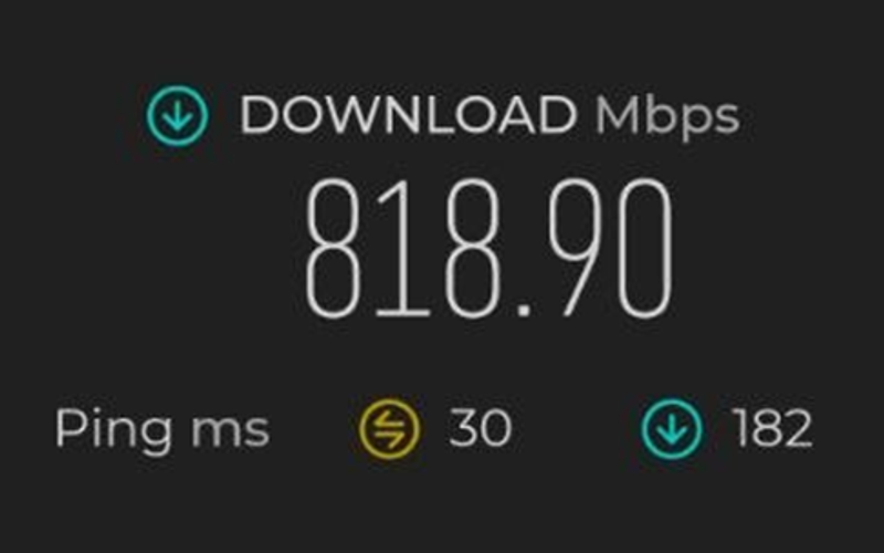 Speedtest result at Heartbeat@Bedok — 818.90 Mbps download on the TP-Link Archer NX500 5G Router